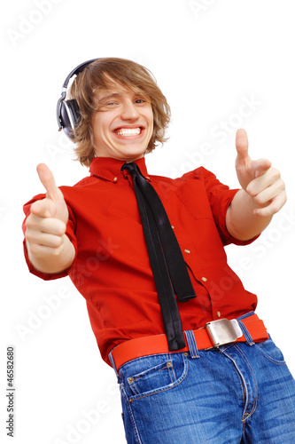 Photo: Happy smiling young man dancing Happy smiling young man dancing