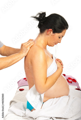 Photo: Pregnant receiving back massage Pregnant receiving back massage
