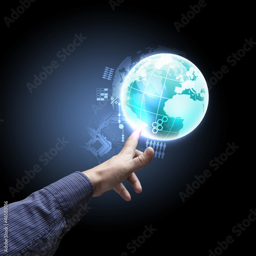 Photo: hand touching the earth hand touching the earth