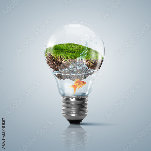 Photo: Lamp bulb with clean nature symbol inside Lamp bulb with clean nature symbol inside