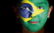 Portrait of a child with a painted flag