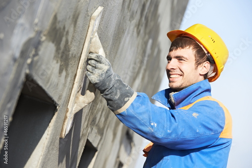 Photo: facade builder plasterer at work facade builder plasterer at work