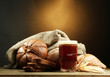 tankard of kvass and rye breads with ears,