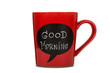 Red ceramic cup with good morning sign made with chalk.