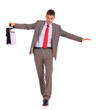 Business man with briefcase walk on wire