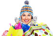 Beautiful shopping Christmas woman with bags.