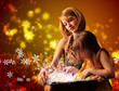 Photo: Young mother and her little daughter reading fairy book Young mother and her little daughter reading fairy book