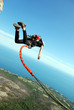 Photo: Jump off a cliff with a rope. Jump off a cliff with a rope.