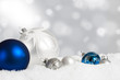 Silver and blue Christmas ornament display