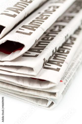 Photo: Various newspapers over white background Various newspapers over white background