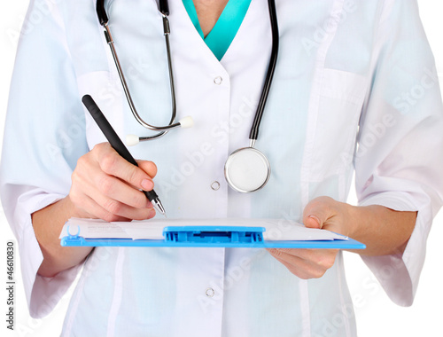Photo: Hand of doctor with pen writing Hand of doctor with pen writing