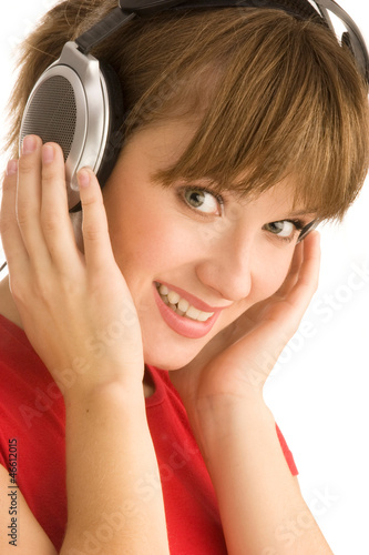 Photo: Young girl with headphones; close-up Young girl with headphones; close-up