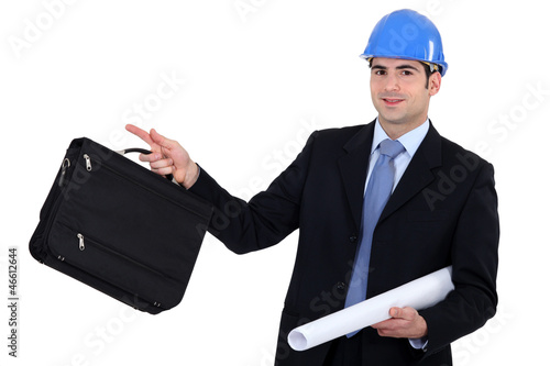 Photo: businessman going on a construction site businessman going on a construction site