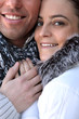 Couple huddling in the cold