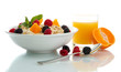 tasty oatmeal with berries and glass of juice, isolated on