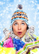 Beautiful christmas girl with shopping bags.