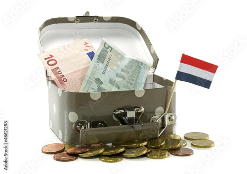 Photo: suitcase with dutch flags and money suitcase with dutch flags and money