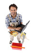 Carpenter posing with a laptop