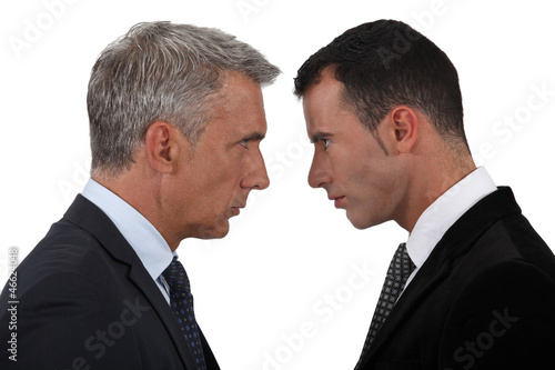 Photo: businessmen having a quarrel businessmen having a quarrel