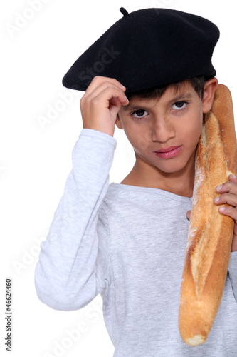 Photo: boy with slice of bread boy with slice of bread