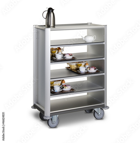 Photo: The hotel cleaning tool cart isolated The hotel cleaning tool cart isolated