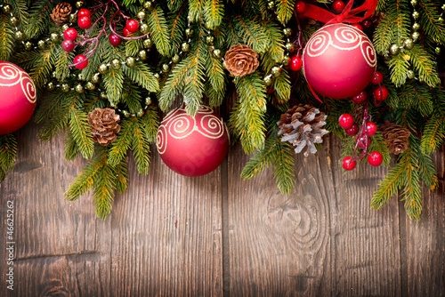 Photo: Christmas Over Wooden Background. Decorations over Wood Christmas Over Wooden Background. Decorations over Wood