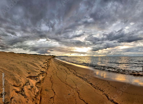 Photo: Sunrise over Lake Malawi on beach Sunrise over Lake Malawi on beach