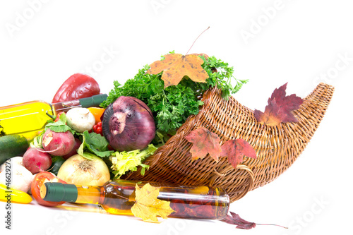 Photo: Autumn cornucopia, olive oli and different group of vegetables Autumn cornucopia, olive oli and different group of vegetables