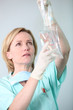 Photo: Nurse preparing IV drip Nurse preparing IV drip