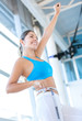 Excited woman loosing weight