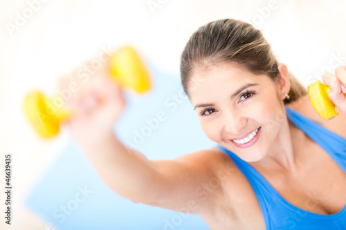 Photo: Woman training at the gym Woman training at the gym