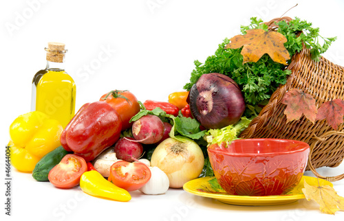 Photo: Autumn cornucopia, vegetables, olive oil and ceramic bowl Autumn cornucopia, vegetables, olive oil and ceramic bowl