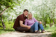 Photo : boy and girl sitting together boy and girl sitting together