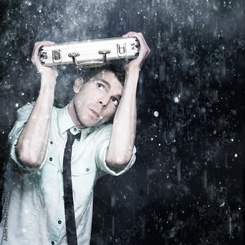 Photo: Worried Male Worker Running In The Pouring Rain Worried Male Worker Running In The Pouring Rain