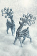 Christmas card. two deers on a snowy background