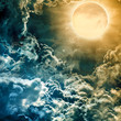 full moon over dark sky with