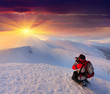 Photo: Photographer takes a sunset in the mountains Photographer takes a sunset in the mountains
