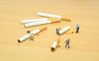 Stop smoking concept with workmen getting rid of cigarettes