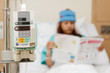 Photo: Woman patient and medical instrument Woman patient and medical instrument