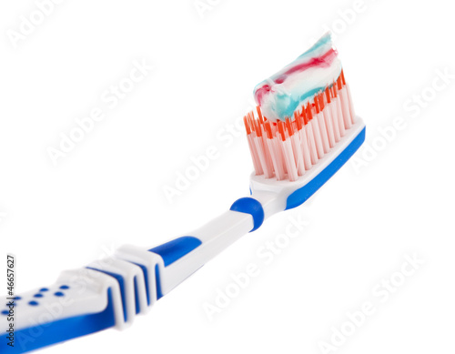 Photo: toothpaste with toothbrush isolated toothpaste with toothbrush isolated