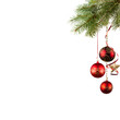 Photo: Red baubles on green christmas firtree on white background Red baubles on green christmas firtree on white background