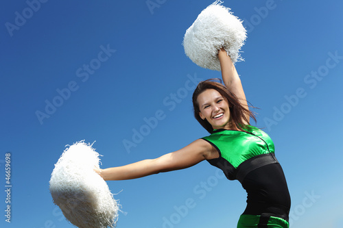 Photo: Young female dancer against white background Young female dancer against white background