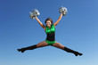 Young female dancer against white background