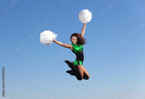 Photo: Young female dancer against white background Young female dancer against white background