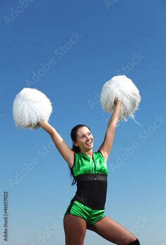 Photo: Young female dancer against white background Young female dancer against white background