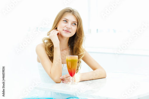 Photo: Young woman in cafe Young woman in cafe
