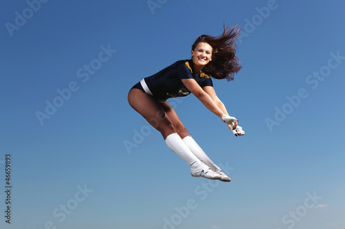 Photo: Young female dancer against white background Young female dancer against white background