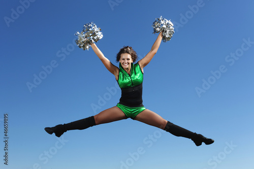 Photo: Young female dancer against white background Young female dancer against white background