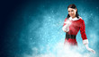 Portrait of girl wearing santa claus clothes