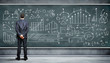 Business person against the blackboard